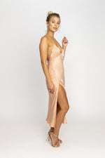 This is an image of Harper Midi - RESA featuring a model wearing the dress