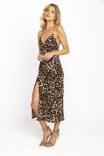 This is an image of Harper Slip Dress - RESA featuring a model wearing the dress
