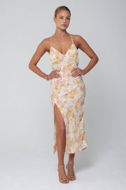 This is an image of Harper Slip in Gardenia - RESA featuring a model wearing the dress