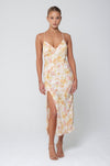 This is an image of Harper Slip in Gardenia - RESA featuring a model wearing the dress