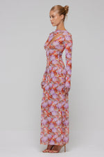 This is an image of Holly Maxi in Coral - RESA featuring a model wearing the dress