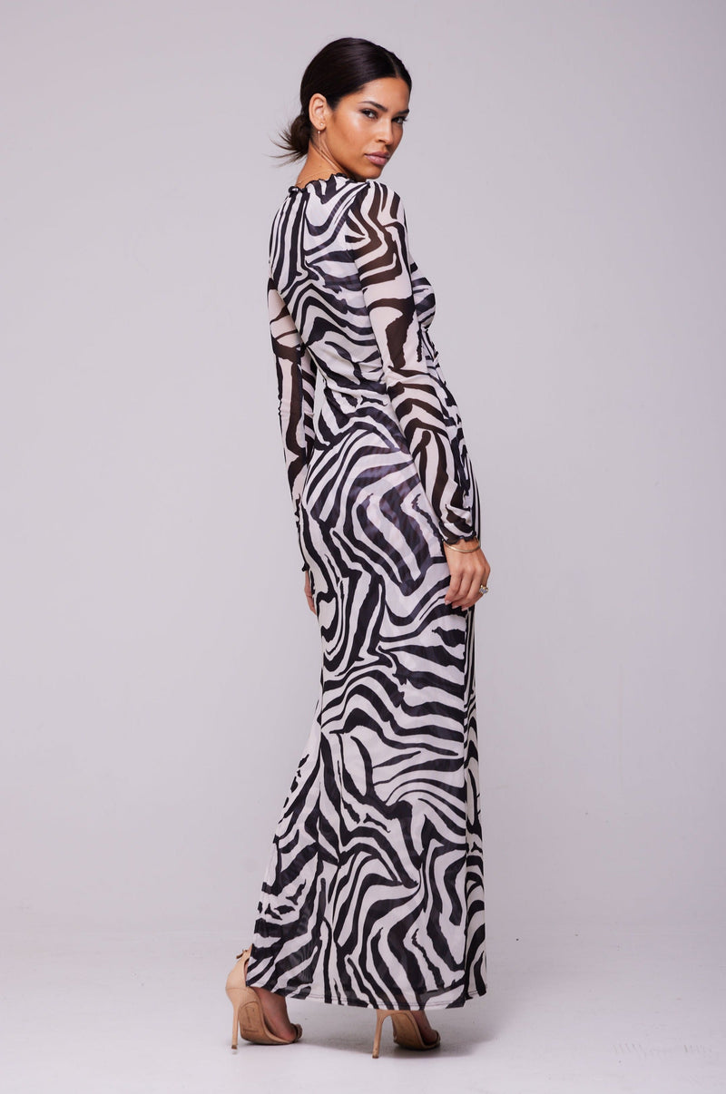 This is an image of Holly Maxi in Tigris - RESA featuring a model wearing the dress