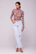 This is an image of Ida Top in Bloom - RESA featuring a model wearing the dress