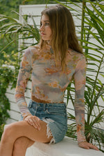 This is an image of Ida Top in Versailles - RESA featuring a model wearing the dress