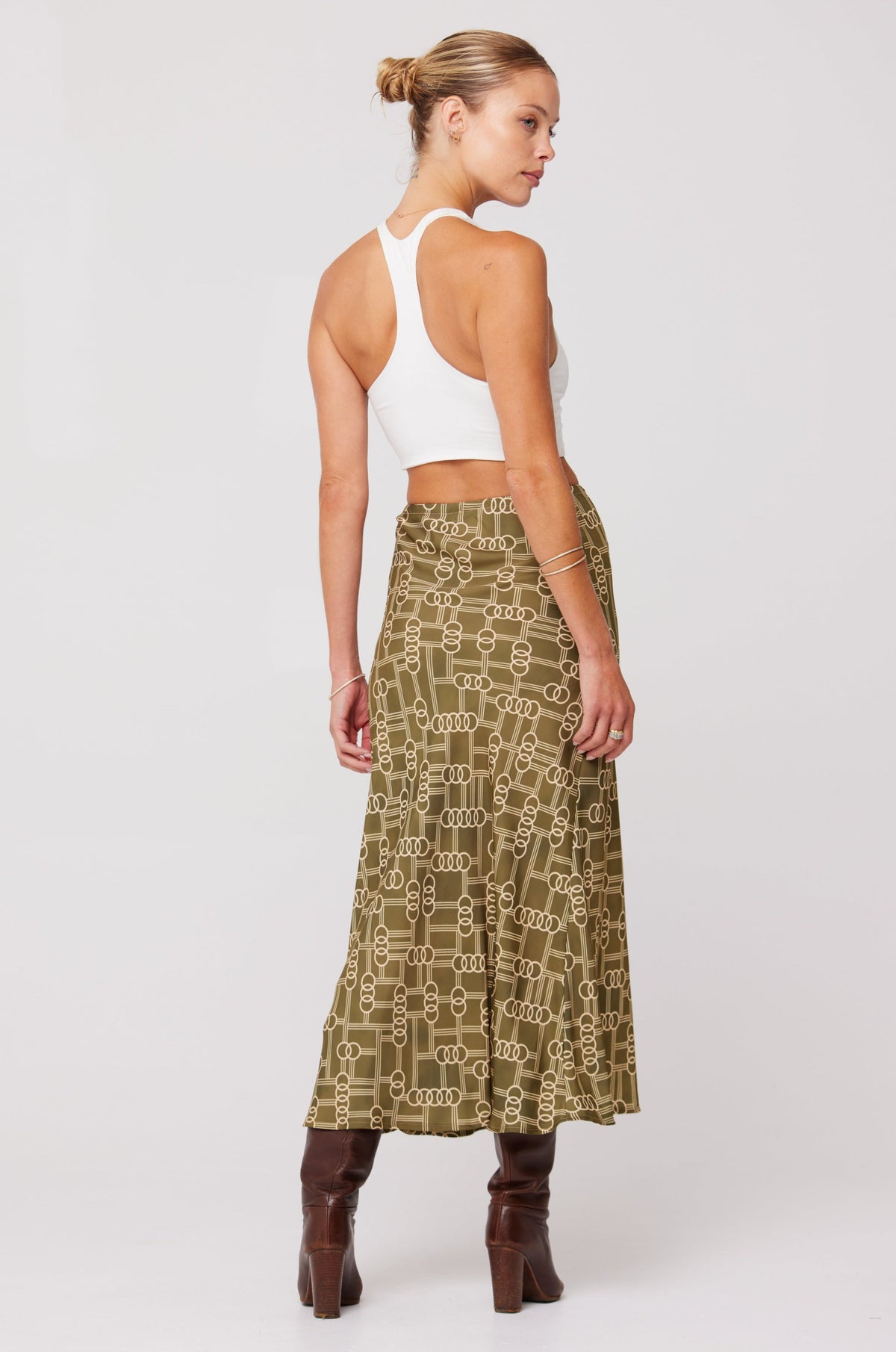 This is an image of Isla Skirt in Link - RESA featuring a model wearing the dress