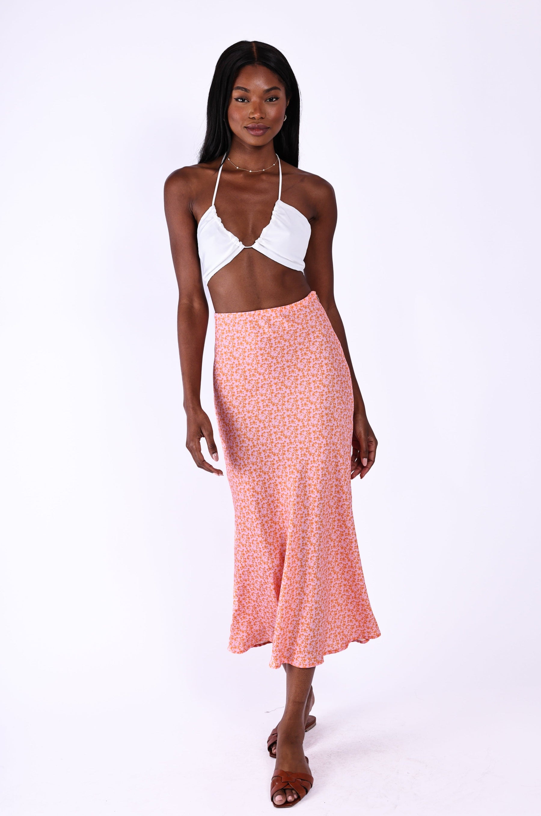 This is an image of Isla Slip Skirt in Summerland - RESA featuring a model wearing the dress