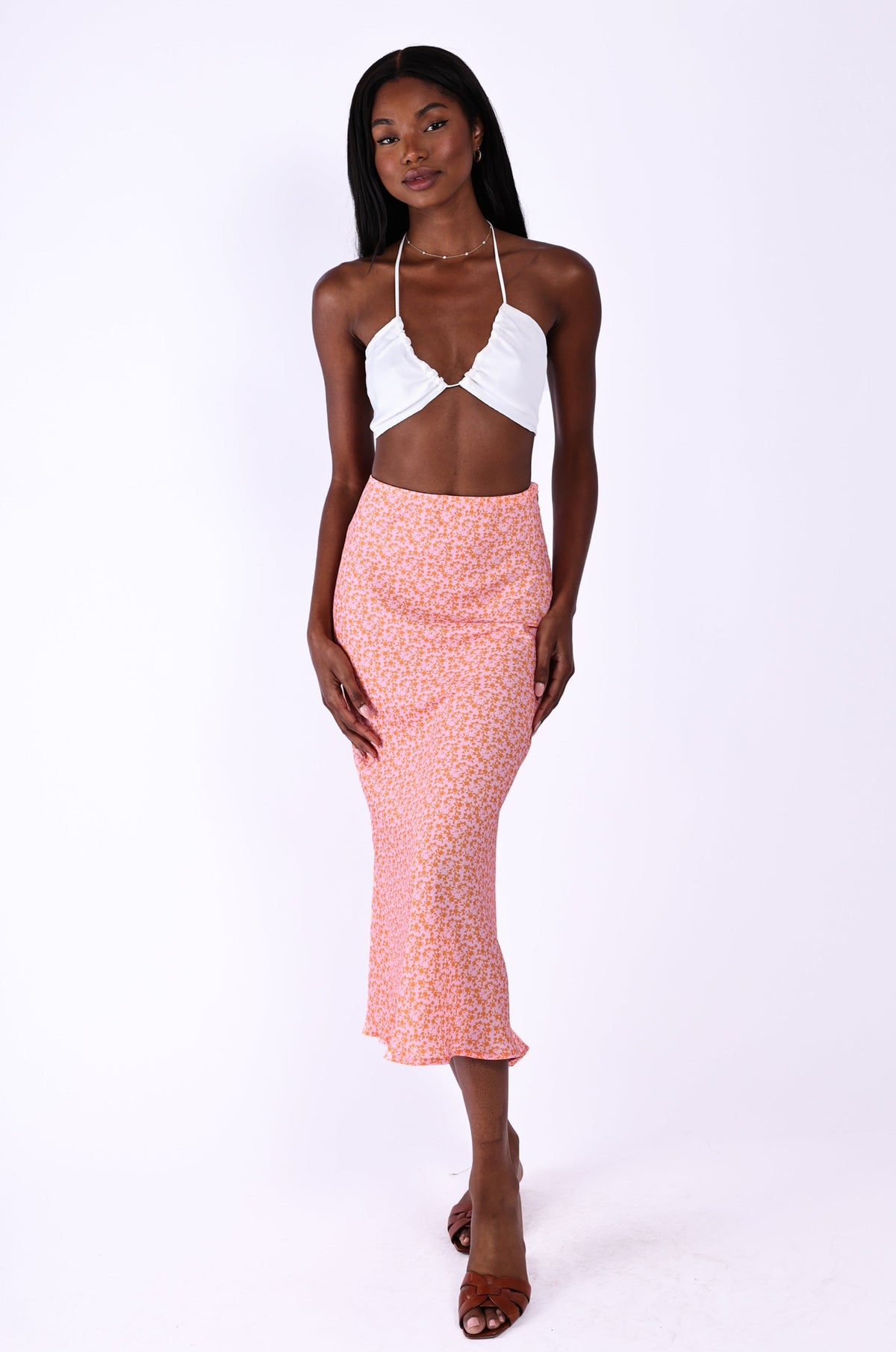 This is an image of Isla Slip Skirt in Summerland - RESA featuring a model wearing the dress