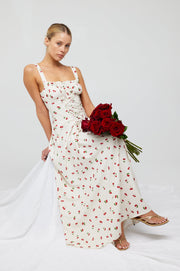 This is an image of Izzy Dress in Cherry - RESA featuring a model wearing the dress