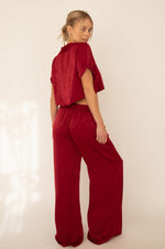This is an image of Jagger Set in Burgundy - RESA featuring a model wearing the dress
