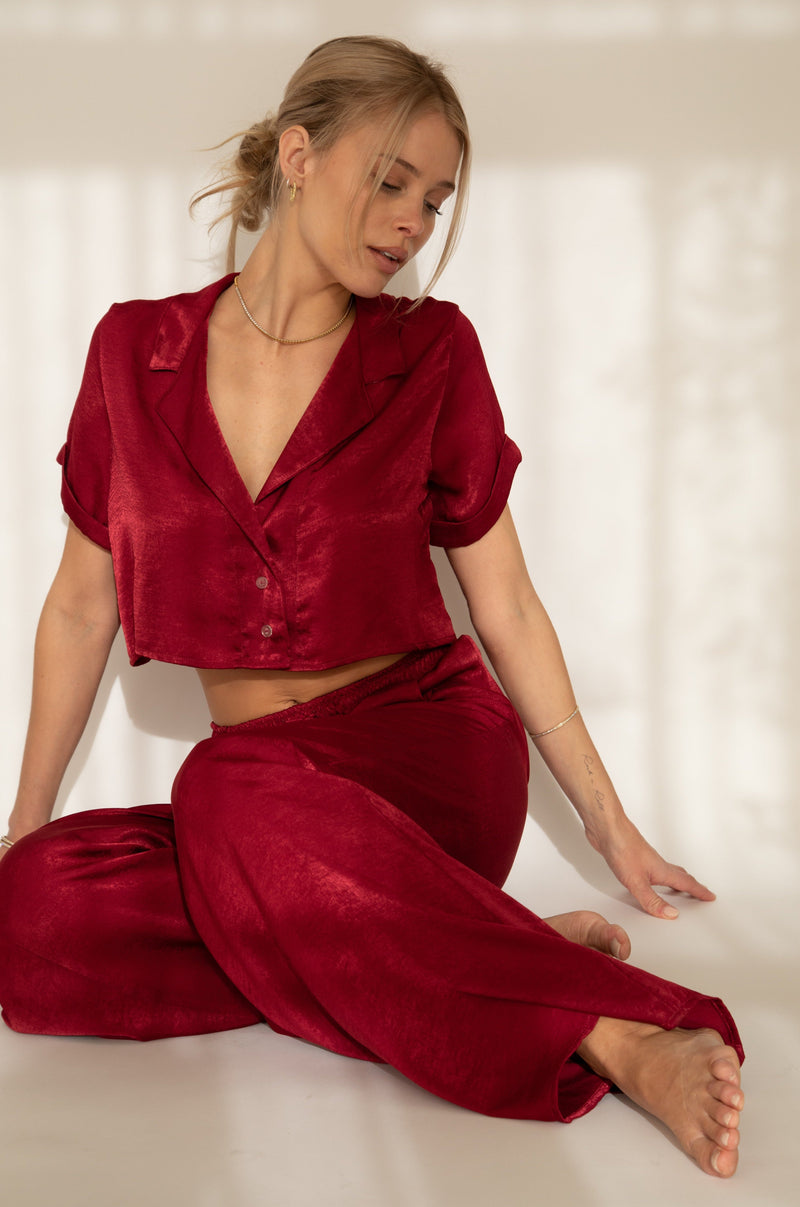 This is an image of Jagger Set in Burgundy - RESA featuring a model wearing the dress