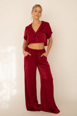 This is an image of Jagger Set in Burgundy - RESA featuring a model wearing the dress