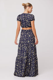 This is an image of Jamie Skirt in Midnight - RESA featuring a model wearing the dress