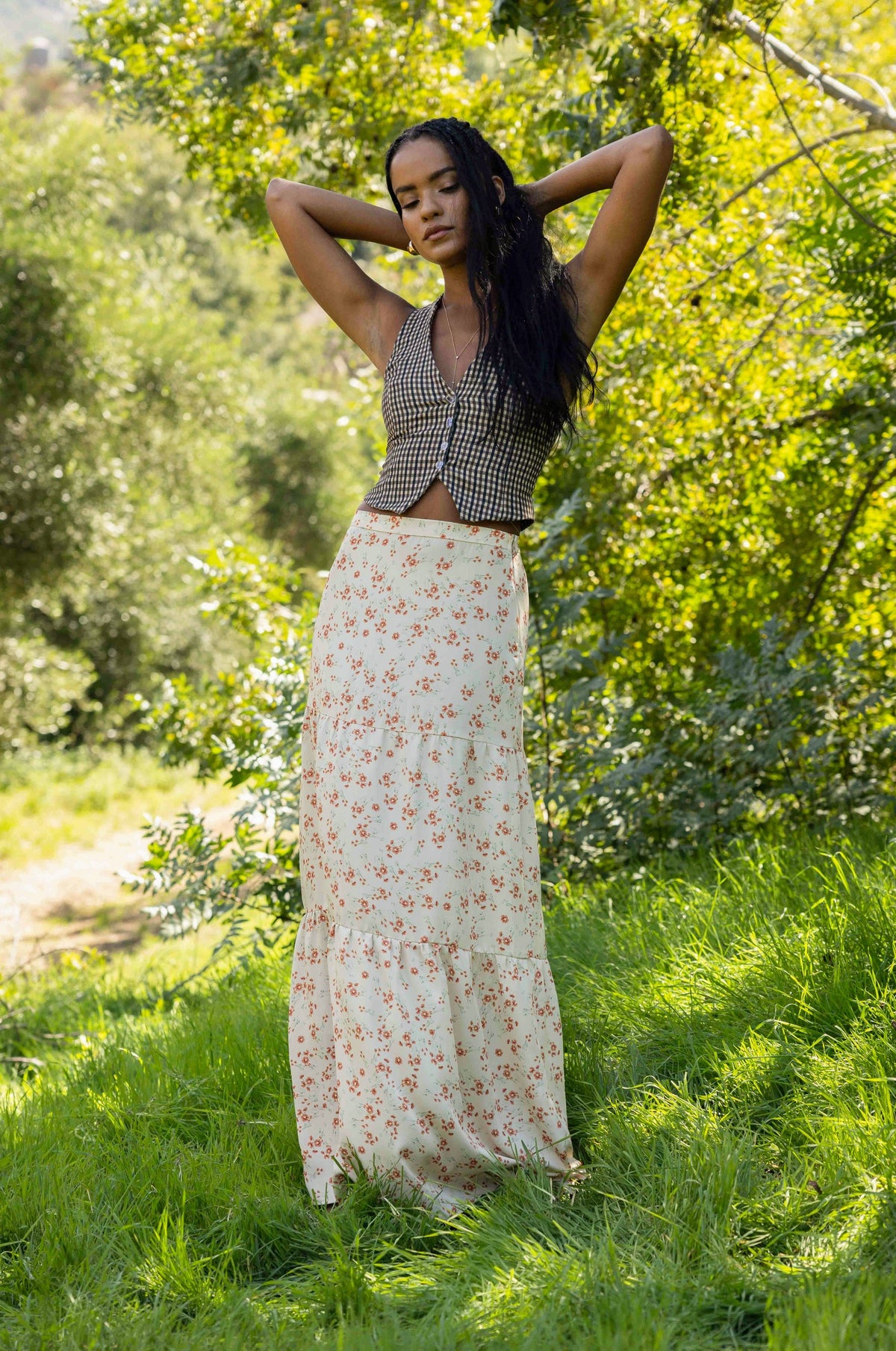 This is an image of Jamie Skirt in Wildflower - RESA featuring a model wearing the dress