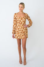 This is an image of Jasmine Mini in Ashland - RESA featuring a model wearing the dress