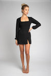 This is an image of Jasmine Mini in Black - RESA featuring a model wearing the dress