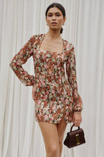 This is an image of Jasmine Mini in Brixton - RESA featuring a model wearing the dress