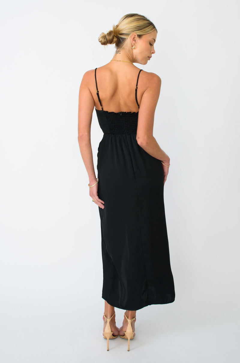 This is an image of Jessica Dress in Black - RESA featuring a model wearing the dress