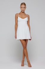 This is an image of Joelle Mini in Dove - RESA featuring a model wearing the dress