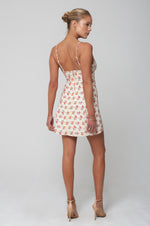This is an image of Joelle Mini in Fawn - RESA featuring a model wearing the dress