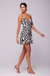 This is an image of Joelle Mini in Tigris - RESA featuring a model wearing the dress