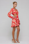 This is an image of Jojo Mini in Frida - RESA featuring a model wearing the dress