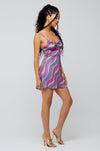 This is an image of Juniper Mini in Candy - RESA featuring a model wearing the dress