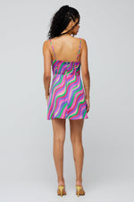 This is an image of Juniper Mini in Candy - RESA featuring a model wearing the dress