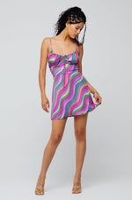 This is an image of Juniper Mini in Candy - RESA featuring a model wearing the dress