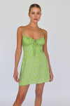 This is an image of Juniper Mini in Kiwi - RESA featuring a model wearing the dress