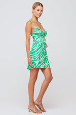This is an image of Juniper Mini in Kona Kelly Green - RESA featuring a model wearing the dress