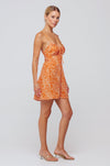 This is an image of Juniper Mini in Orange Zebra - RESA featuring a model wearing the dress