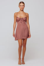 This is an image of Juniper Mini in Polka Dot - RESA featuring a model wearing the dress