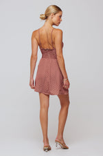 This is an image of Juniper Mini in Polka Dot - RESA featuring a model wearing the dress