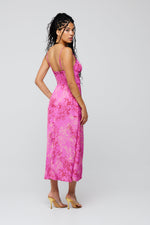 This is an image of Kaitlyn Midi in Azalea - RESA featuring a model wearing the dress