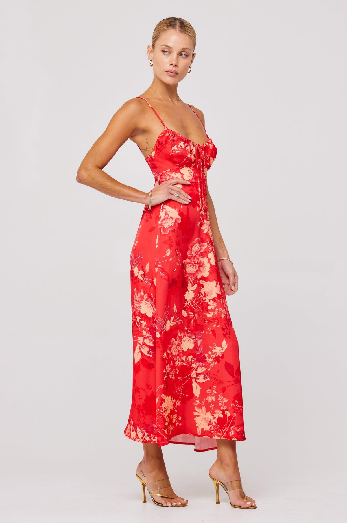 This is an image of Kaitlyn Midi in Blossom - RESA featuring a model wearing the dress