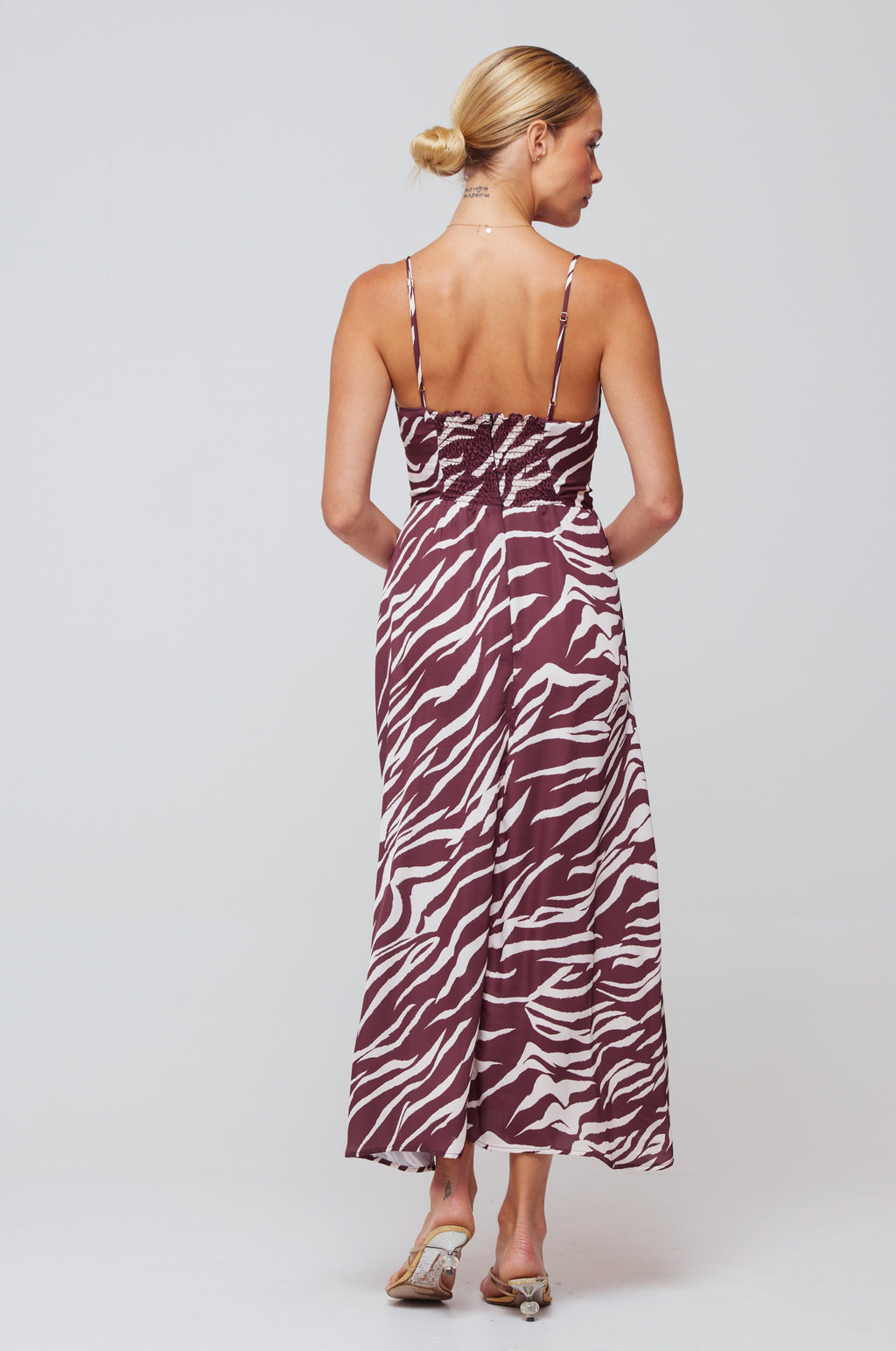 This is an image of Kaitlyn Midi in Kona Chocolate Brown - RESA featuring a model wearing the dress
