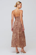 This is an image of Kaitlyn Midi in Paris - RESA featuring a model wearing the dress