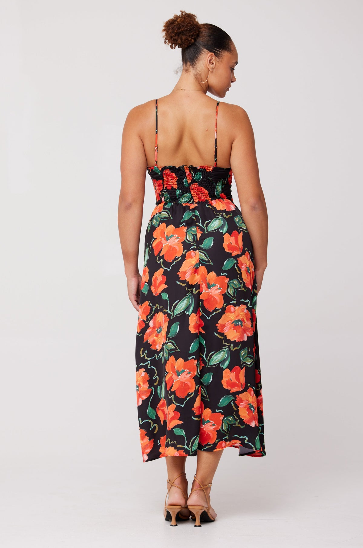 This is an image of Kaitlyn Midi in Poppy - RESA featuring a model wearing the dress