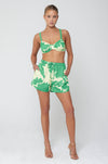 This is an image of Kalani Shorts in Rico - RESA featuring a model wearing the dress