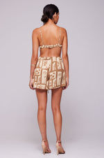 This is an image of Kalani Shorts in Trestles - RESA featuring a model wearing the dress