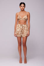 This is an image of Kalani Shorts in Trestles - RESA featuring a model wearing the dress