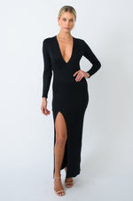 This is an image of Kate Knit Dress in Black - RESA featuring a model wearing the dress