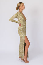 This is an image of Kate Knit Dress in Sardinia - RESA featuring a model wearing the dress