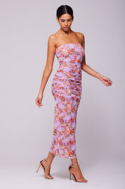 This is an image of Kristina Midi in Coral - RESA featuring a model wearing the dress