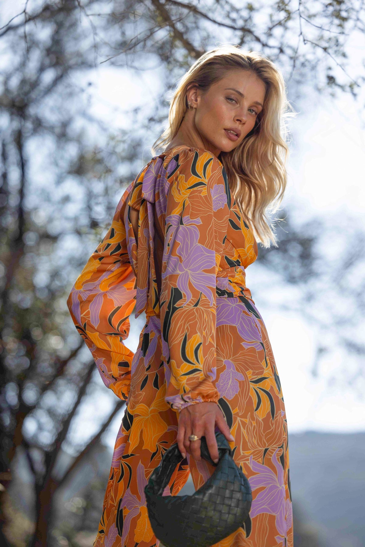 This is an image of Lenny Jumpsuit in Doheny - RESA featuring a model wearing the dress