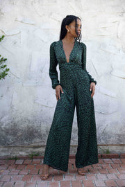This is an image of Lenny Jumpsuit in Sparrow - RESA featuring a model wearing the dress