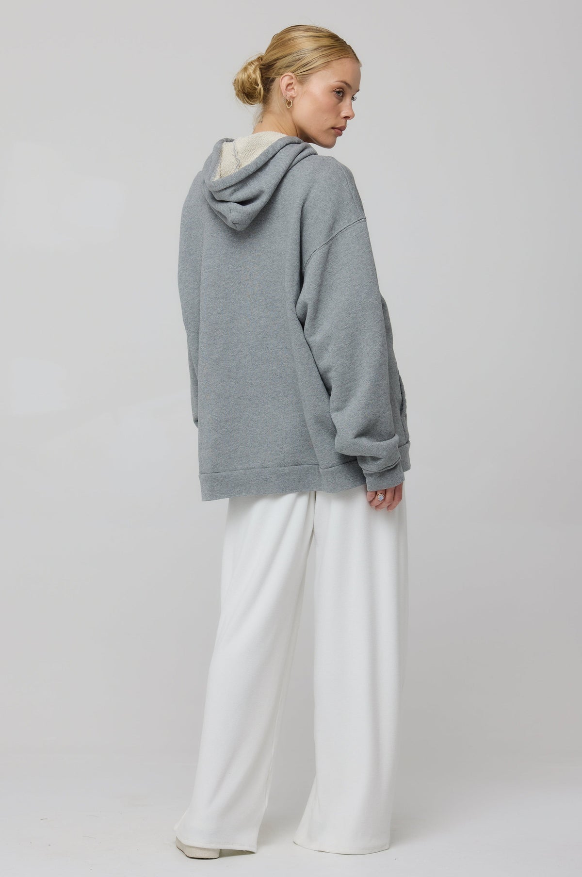 This is an image of Leo Hoodie in Grey - RESA featuring a model wearing the dress