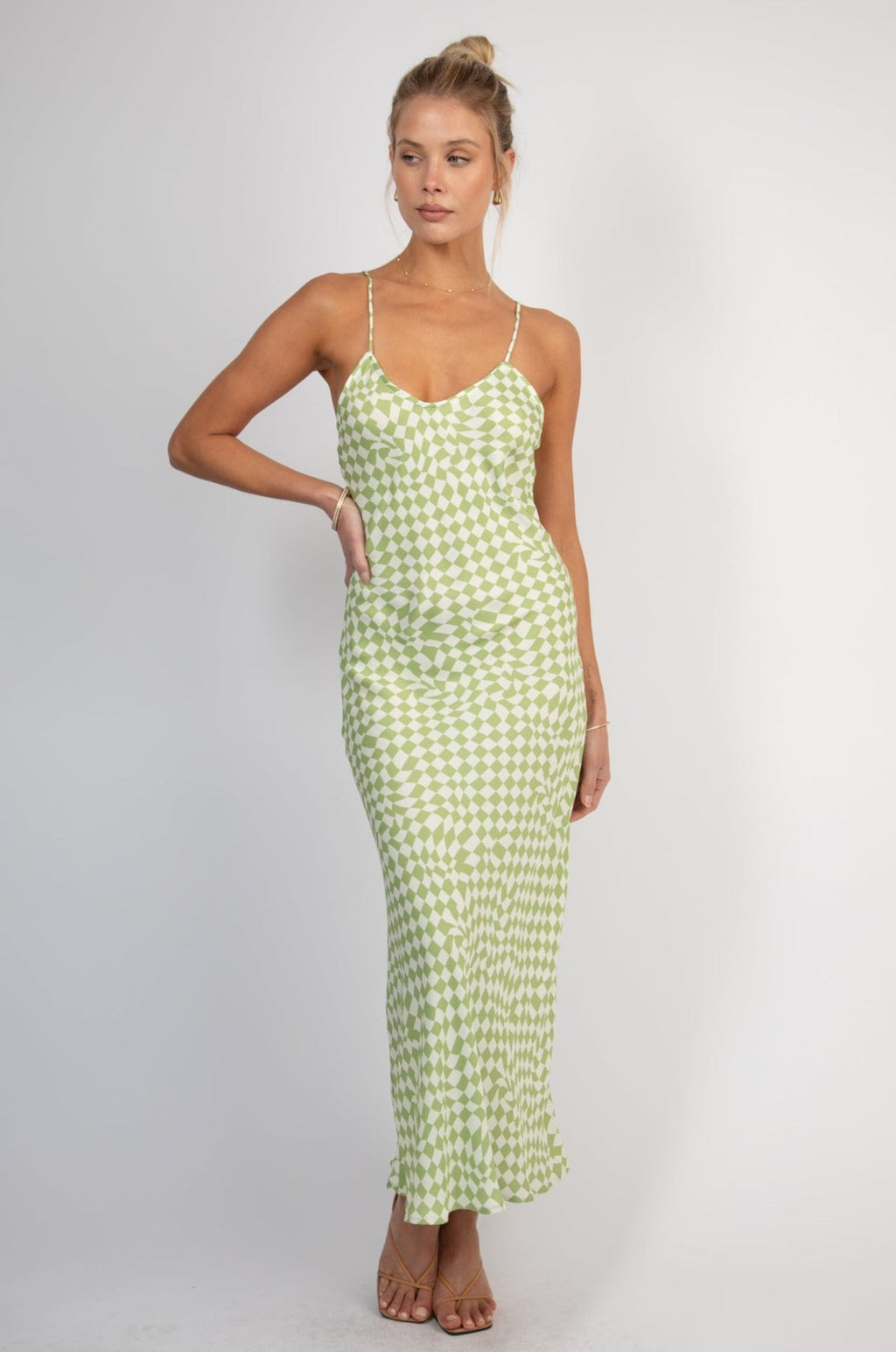 This is an image of Lily Slip - RESA featuring a model wearing the dress