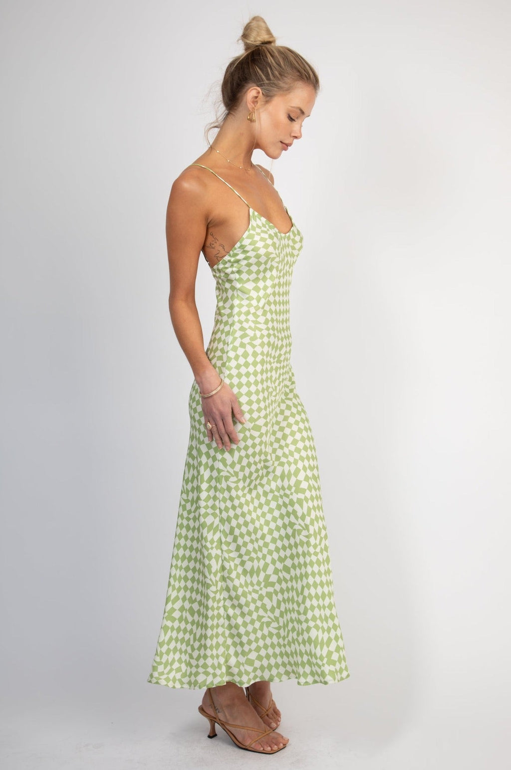 This is an image of Lily Slip - RESA featuring a model wearing the dress