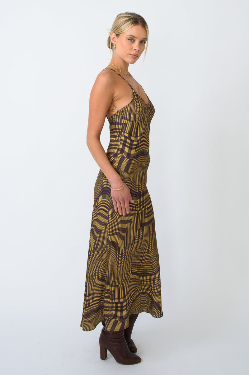 This is an image of Lily Slip in Clueless - RESA featuring a model wearing the dress